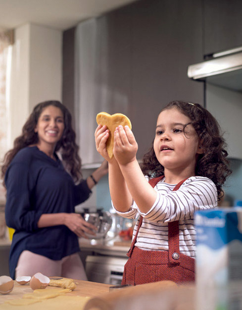 Mother and Kid Baking Together Happily