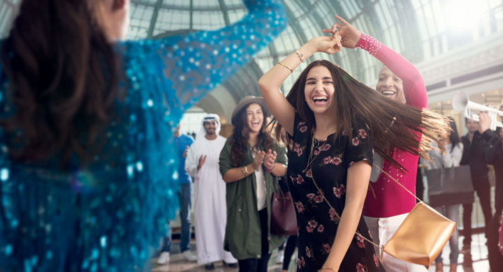 Women Dancing in the mall