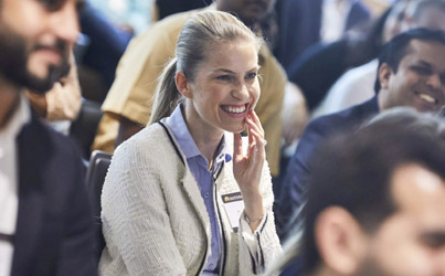 Happy Employee in Conference